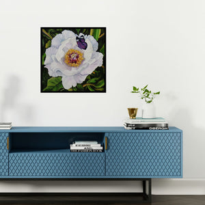 Preview of 'White Flower With Butterfly (Golden Radiance)' Painting by Sulakshana Dharmadhikari shown on a wall in a furnished room.