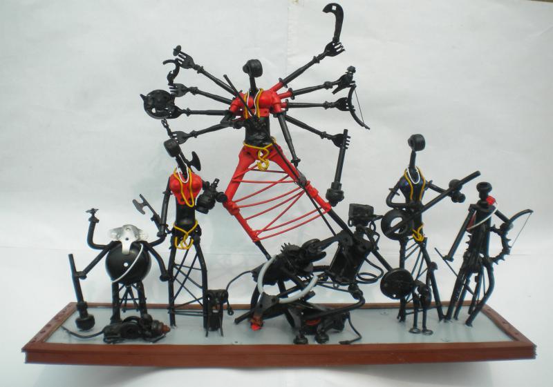 Religious sculpture titled 'Durga', 24x30x9 inches, by artist Uttam Manna on Iron