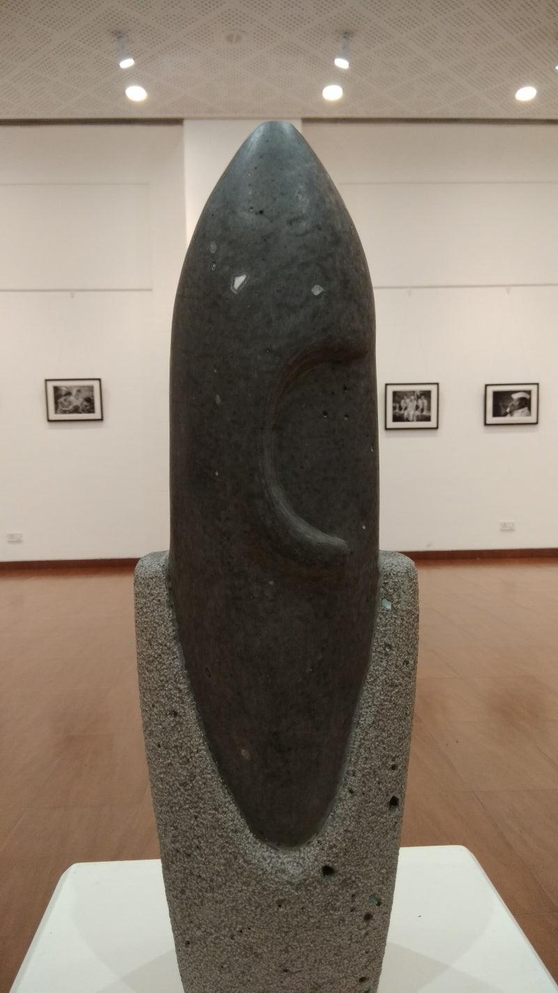 Religious sculpture titled 'Ganesha', 18x8x8 inches, by artist Hariram Phad on Black Basalt Stone