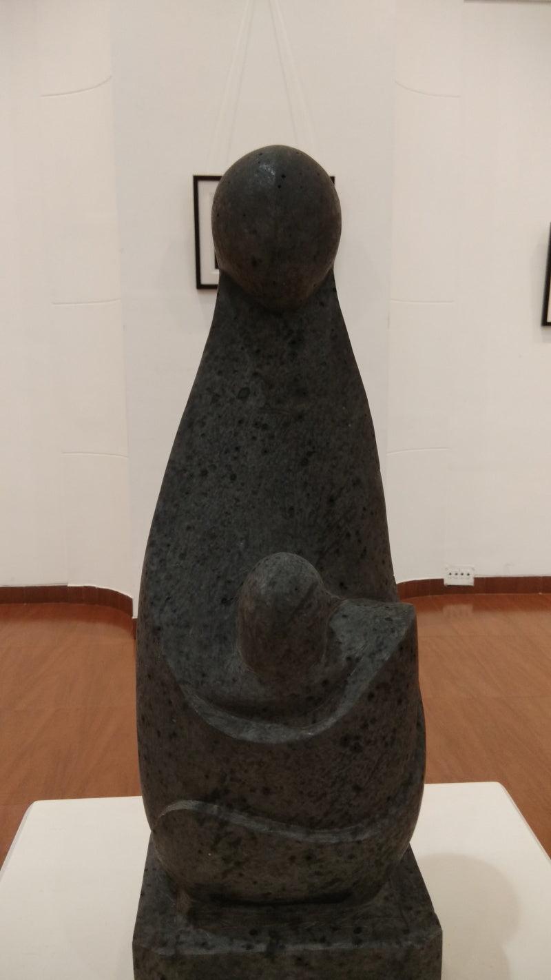 Figurative sculpture titled 'Mother And Child', 24x12x12 inches, by artist Hariram Phad on Black Basalt Stone