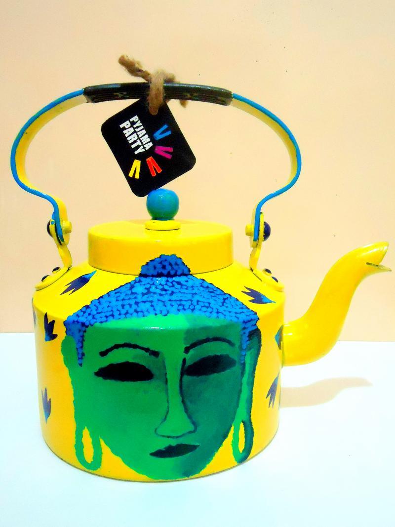 Lifestyle craft titled 'Shades Of Buddha Yellow Tea Kettle', 9x9x7 inches, by artist Rithika Kumar on Aluminium