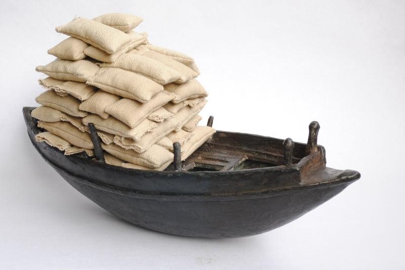 Still-life sculpture titled 'Still Life', 10x14x7 inches, by artist Tarun Maity on Bronze, Rice Bag