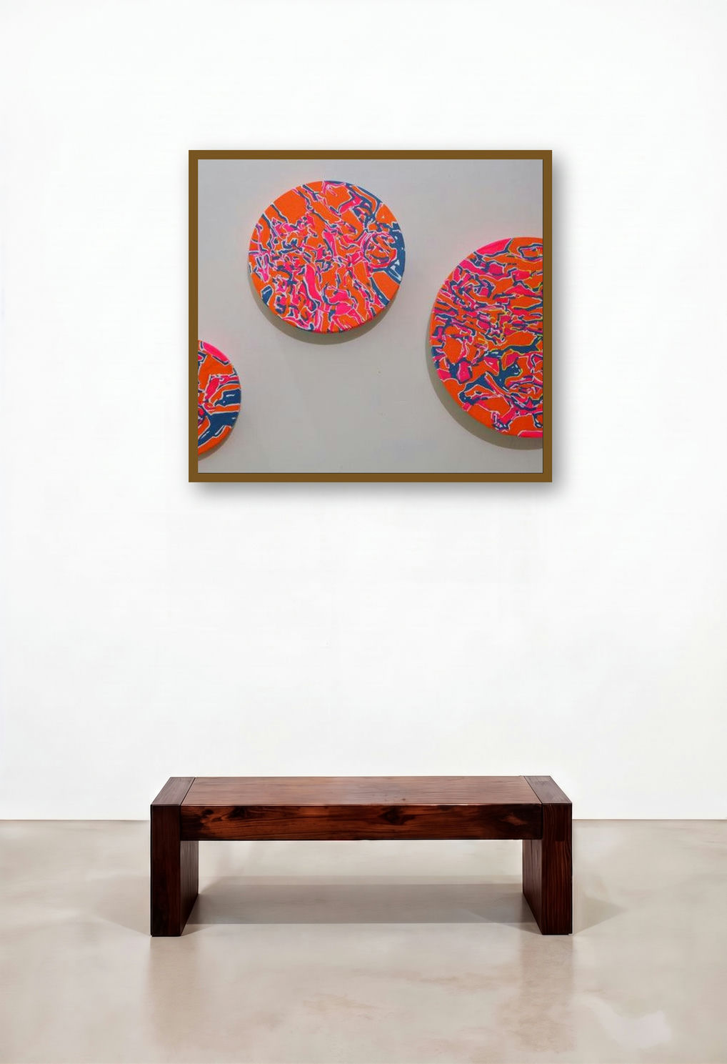 Untitled 2 (Vibrant Discs) by artist Meena Pathak displayed in a Urban Loft Hotel Lobby