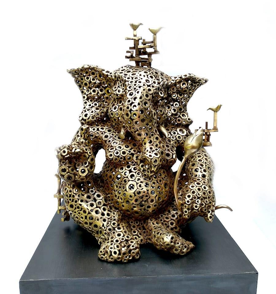 Religious sculpture titled 'Vinayaka', 16x14x10 inches, by artist Pintu Sikder on Brass