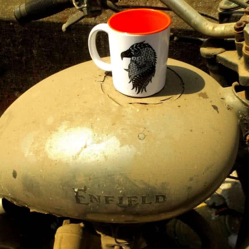 Lifestyle craft titled 'Albert Mug On Enfield', 4x3 inches, by artist Rithika Kumar on Ceramic