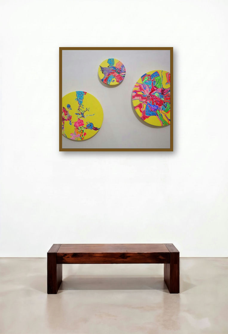 Almost Yellow (Vibrant Discs) by artist Meena Pathak displayed in a Boutique Hotel Style Reception Area
