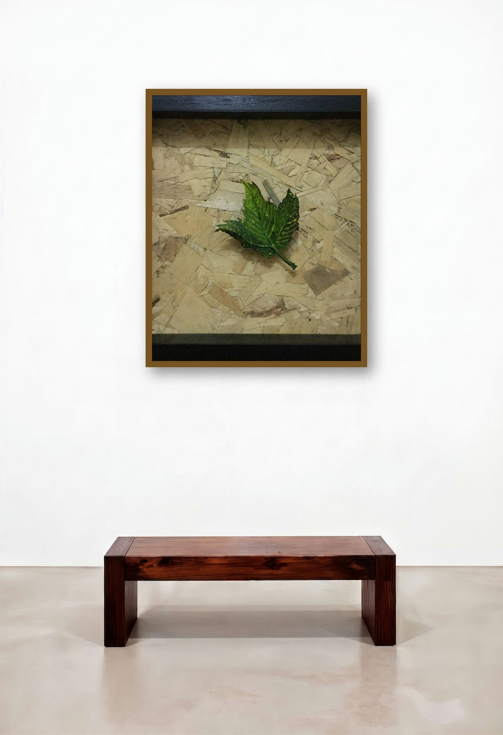 Assertive Autumn 4 (Green Leaf in Dark Frame) by artist Pradip Tupe displayed in a Rustic Dining Room