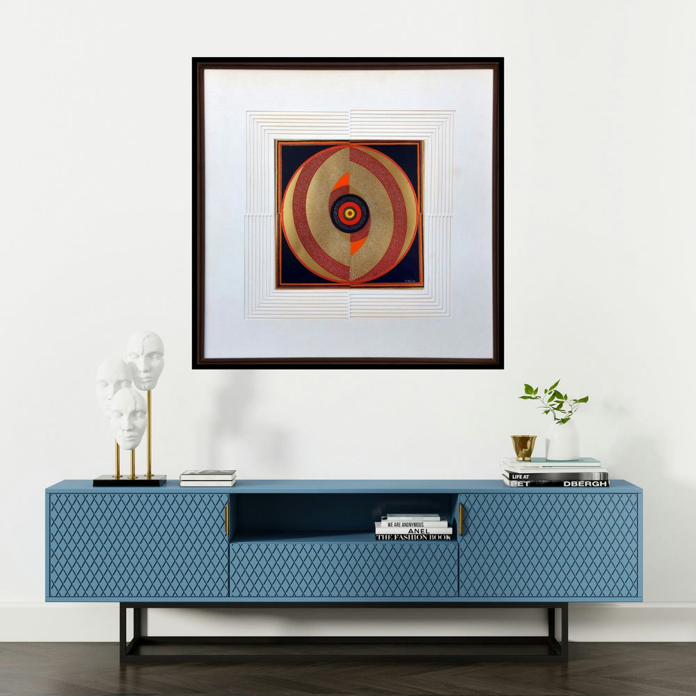 'Asymmetry (Circular Abstraction in Gold and Red)' painting by Bhiva Punekar shown on a wall in a furnished room.