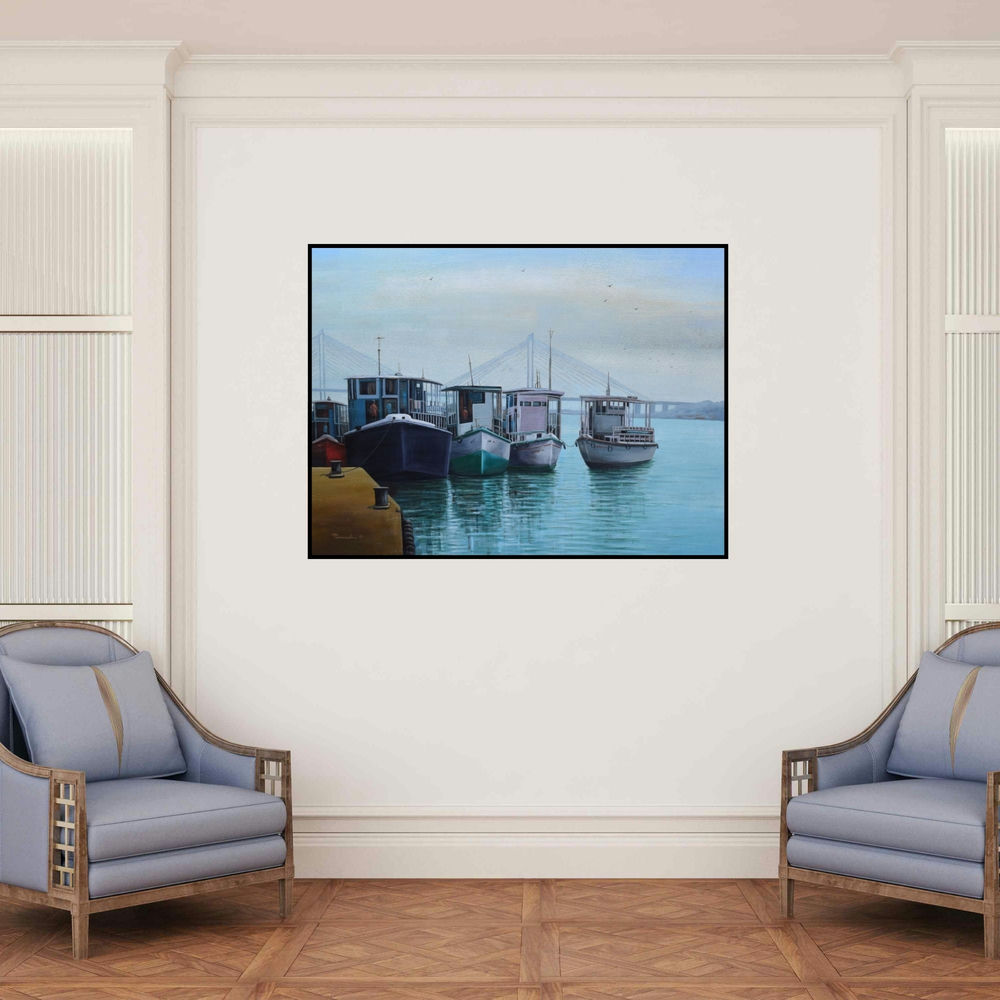 'Babu Ghat 2 (Morning on the Hooghly)' painting by Purnendu Mandal shown on a wall in a furnished room.