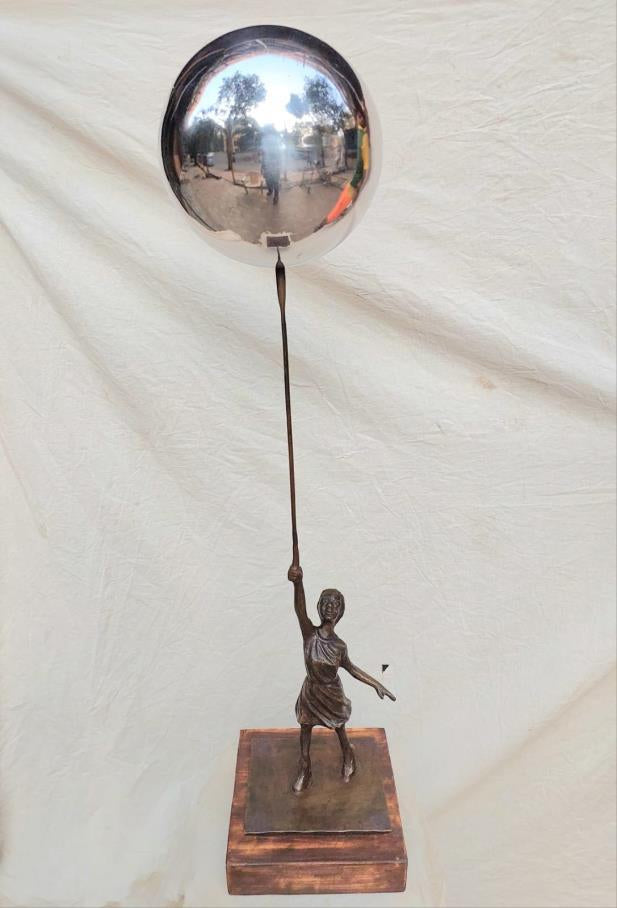 Ballon With Girl' figurative Brass, Metal sculpture by artist Rohan Sonavane, 35x7 inch, on brass, metal