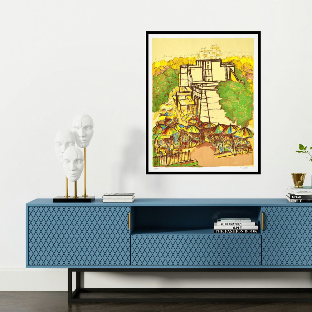 'Bhadra Darwaza (A Bustling Market)' painting by Vrindavan Solanki shown on a wall in a furnished room.