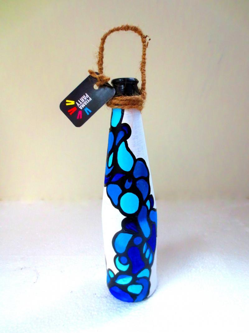 Lifestyle craft titled 'Bottle Planter Fluid Blue', 9x3x9 inches, by artist Rithika Kumar on Recycled Glass