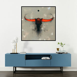 'Bull Face' painting by Amol Pawar shown on a wall in a furnished room.