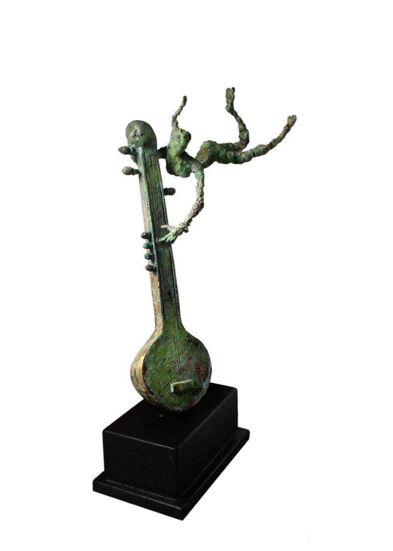 Figurative sculpture titled 'Celebration iii', 16x6x28 inches, by artist Rohan Pawar on Brass
