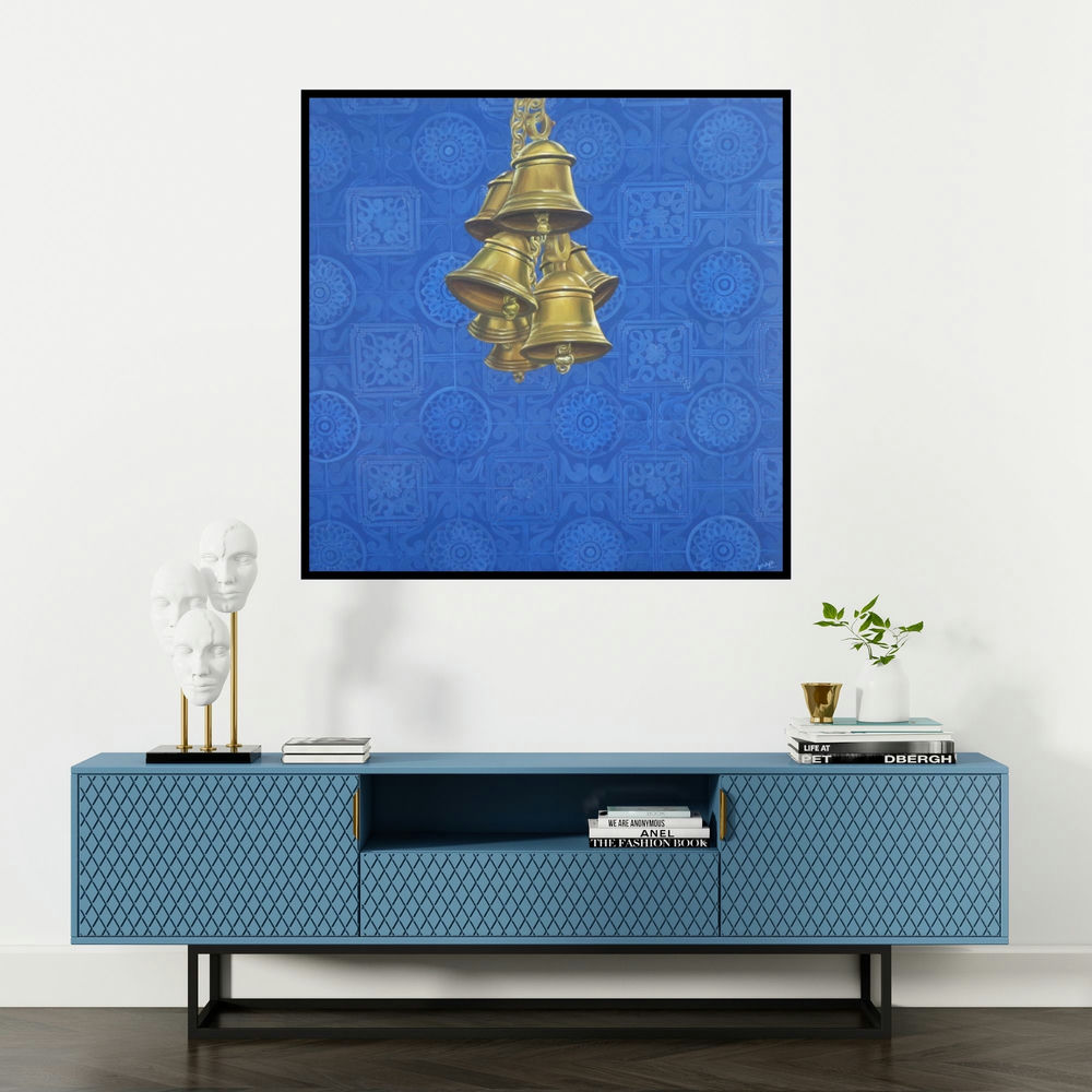 'Celestial Bells' painting by Divya Chinni shown on a wall in a furnished room.