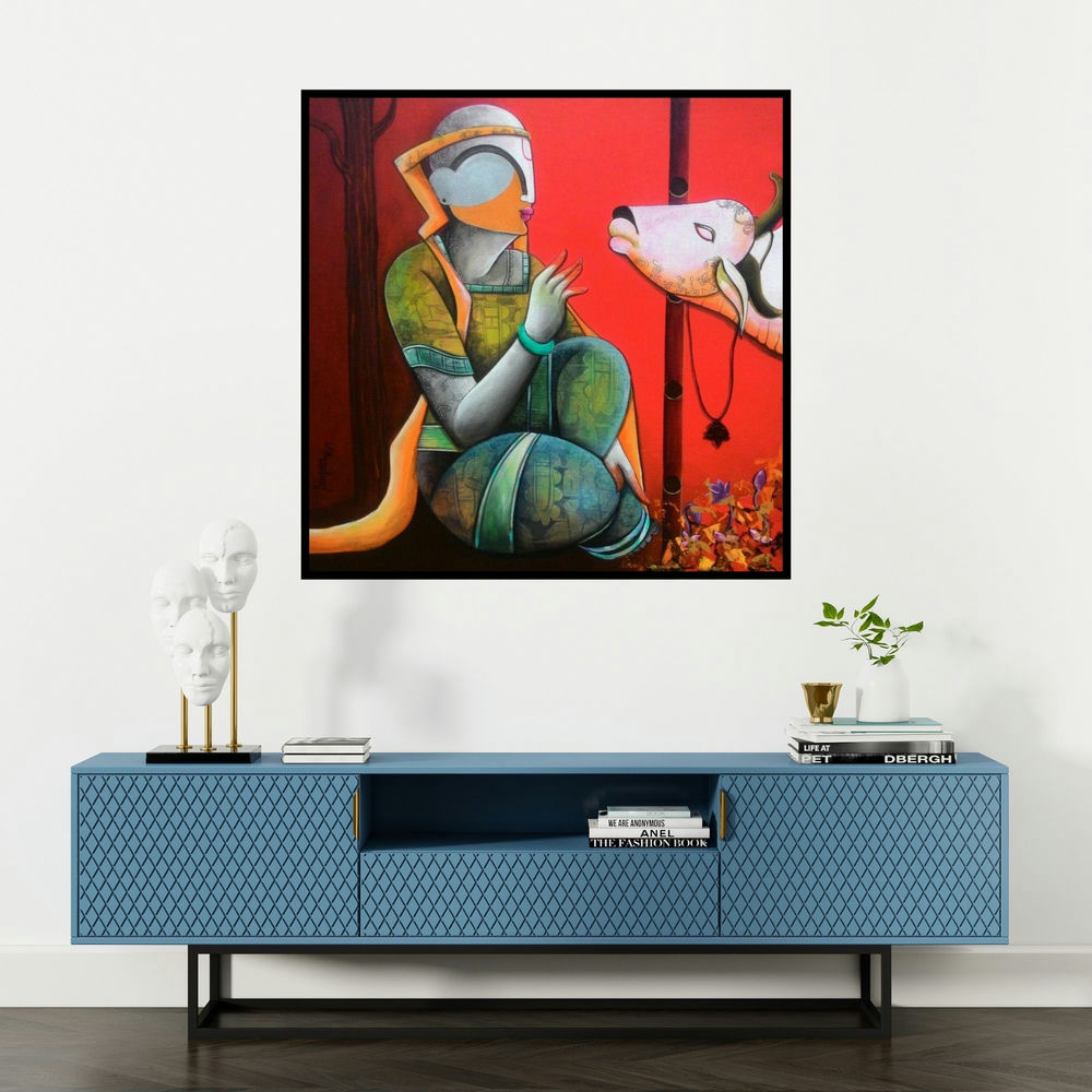 'In A Conversation' painting by Anupam Pal shown on a wall in a furnished room.