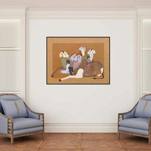 'Cow Family 2' painting by Ag Nellagi shown on a wall in a furnished room.