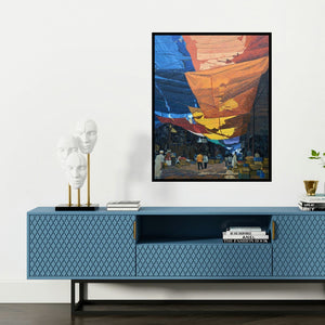 'Crawford Market (Under the Canopy)' painting by Prashant Kulkarni shown on a wall in a furnished room.