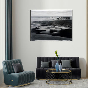 Manish Sharma's 'Desert (Desert Crossing)' painting visualized above a sofa in a contemporary room.