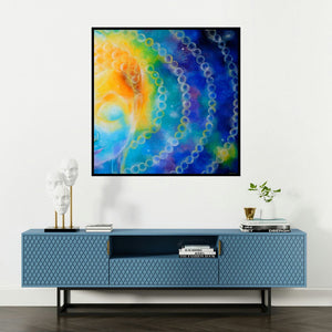 'Divine Compassion I' painting by Drishti Vohra shown on a wall in a furnished room.