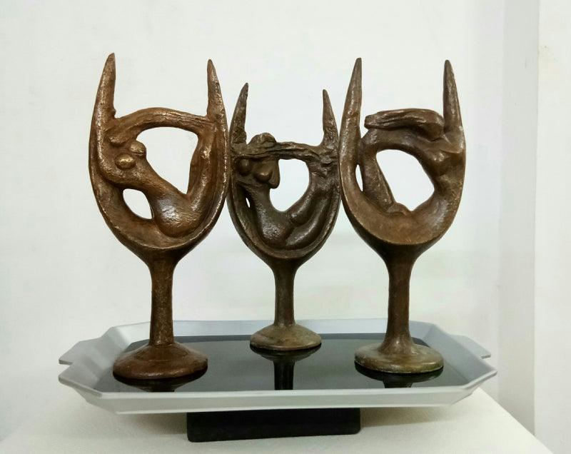 Figurative sculpture titled 'Dream Glasses', 11x16x10 inches, by artist Dilip Paul on Bronze, Aluminium