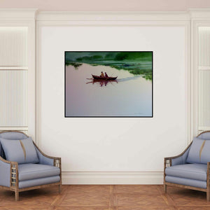 'Fishermen In Boat (Rivers Embrace: A Moment of Stillness)' painting by Narayan Shelke shown on a wall in a furnished room.
