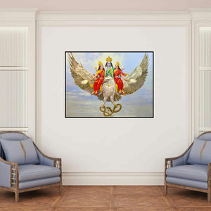 'Garuda The Divine Vahana Of Lord Vishnu (Vishnu and Lakshmi on Garuda)' painting by Vasudeo Kamath shown on a wall in a furnished room.