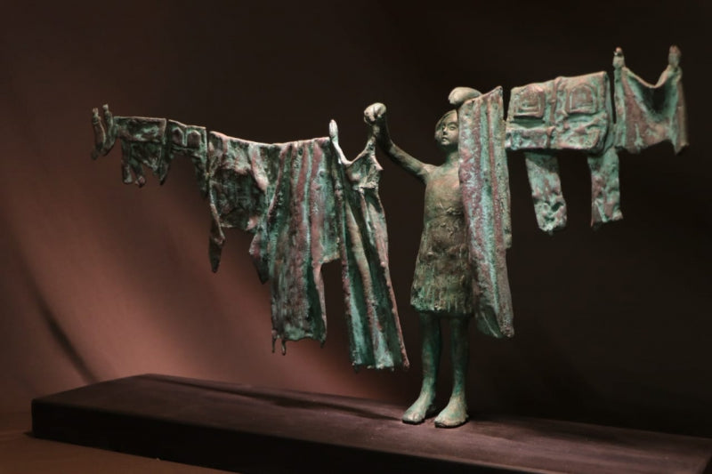 Homework' figurative Brass sculpture by artist Rohan Pawar, 16x27 inch, on brass