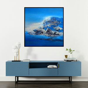 'Iceberg' painting by Dnyaneshwar Dhavale shown on a wall in a furnished room.