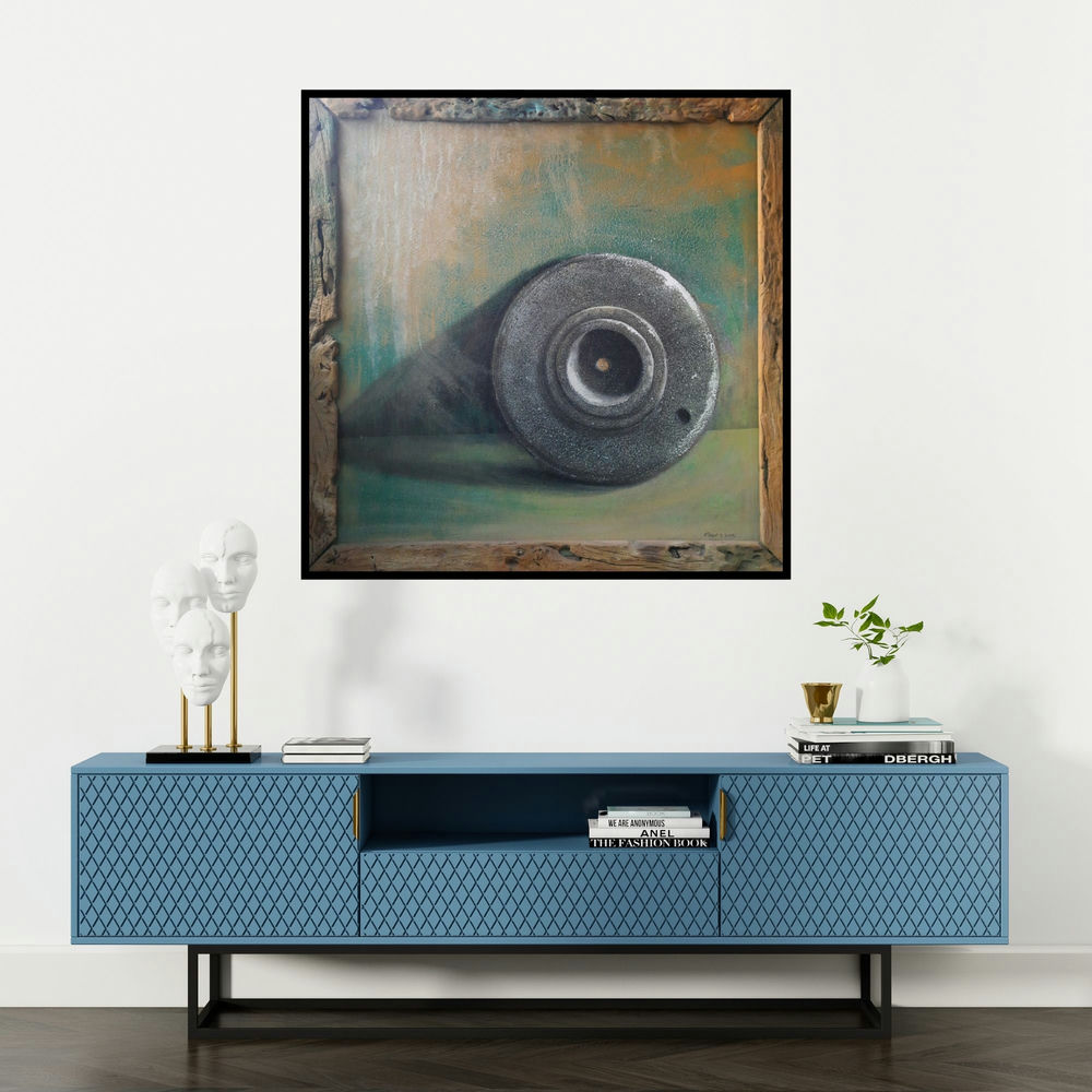 'Jaata (Relic of War)' painting by Gopal Pardeshi shown on a wall in a furnished room.