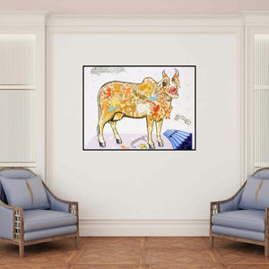 'Jeevan Ek Rangmanch (The Dreaming Cow)' painting by Fayyaz Khan shown on a wall in a furnished room.