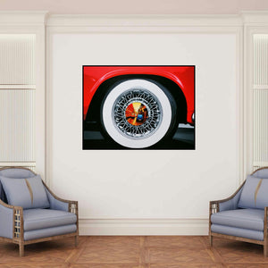 'Life Wheel 22 (A Glimpse Through Time)' painting by Sujit Karmakar shown on a wall in a furnished room.