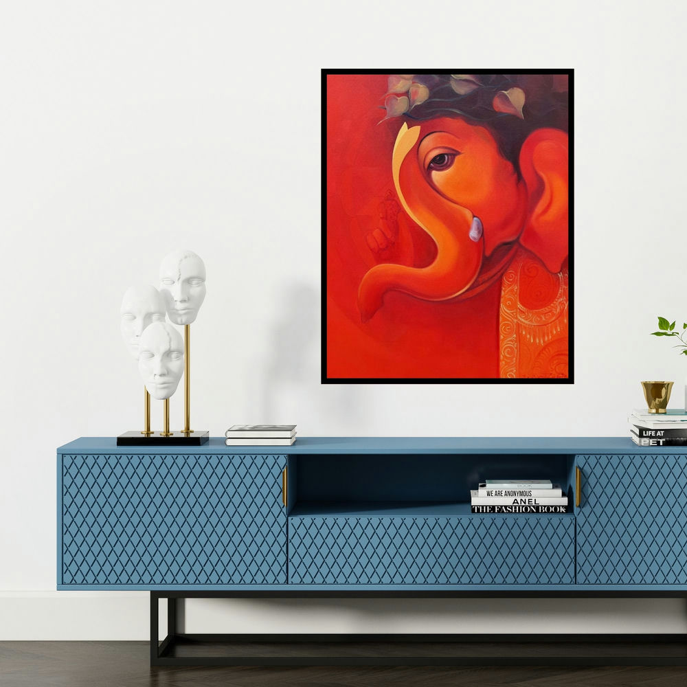 'Lord Ganesha (Crimson Aura)' painting by Solomon R shown on a wall in a furnished room.