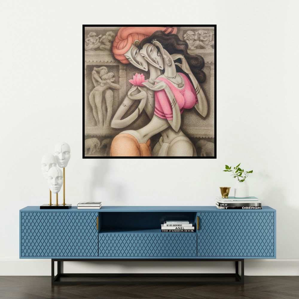 'Love At Khajuraho (Eternal Bond)' painting by Ramesh Pachpande shown on a wall in a furnished room.