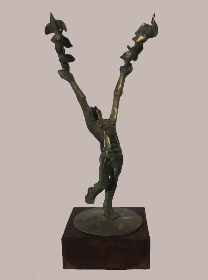 Man With Flying Birds' figurative Brass, Metal sculpture by artist Rohan Sonavane, 20x11 inch, on brass, metal