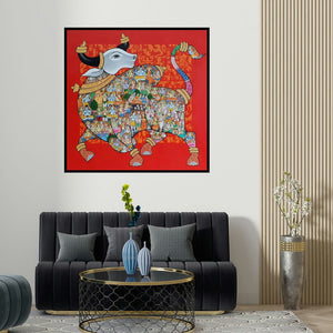 Vivek Kumavat's 'Nandi 38' painting visualized above a sofa in a contemporary room.