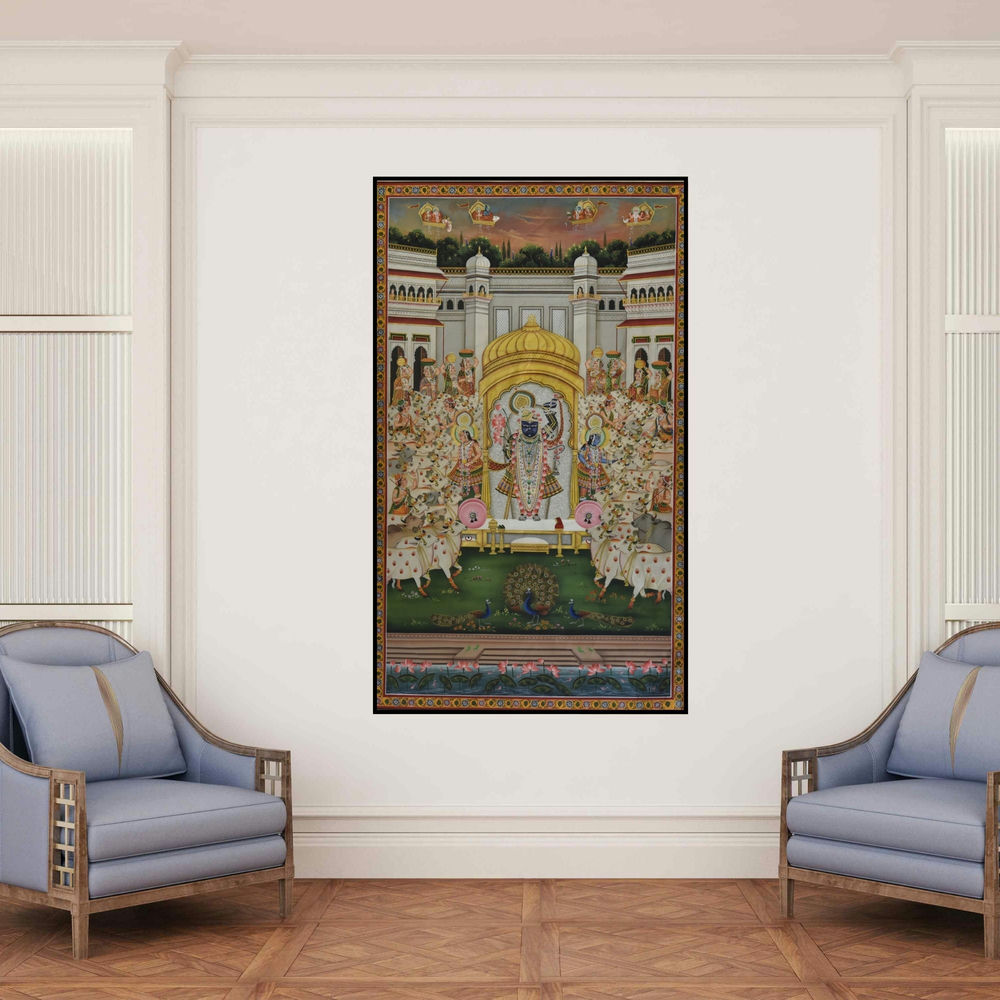 'Pichwai (Shrinathji's Grand Darshan)' painting by Unknown shown on a wall in a furnished room.