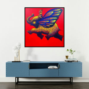 'Playing Flute On Elephant 2 (Flight of Fancy)' painting by Ramesh Gujar shown on a wall in a furnished room.