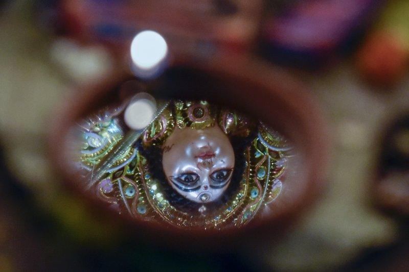 Religious photography titled 'Reflection of Goddess', 11x17 inches, by artist Amit Dutta on