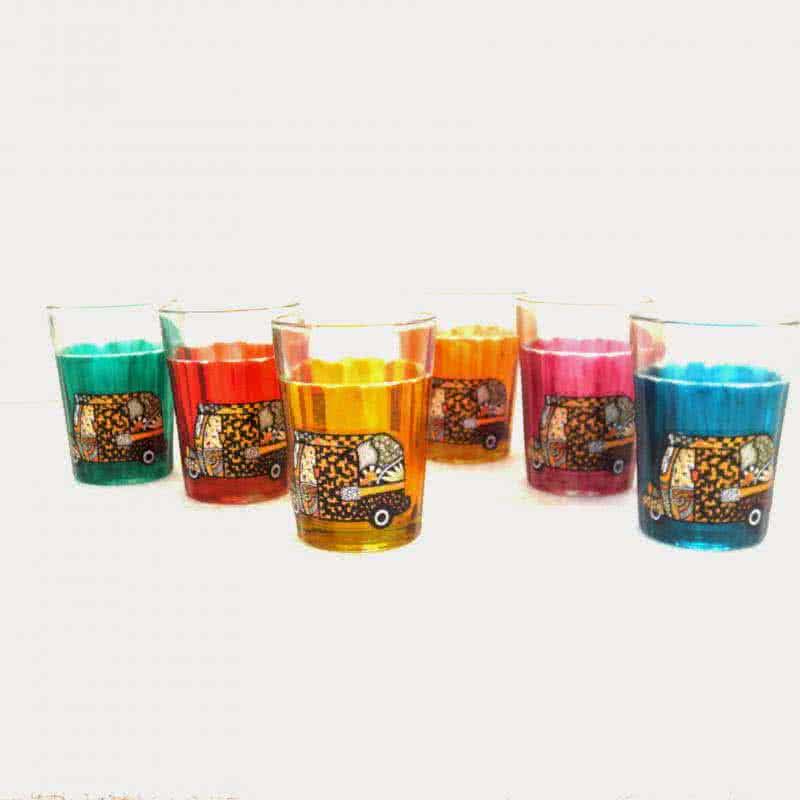 Lifestyle craft titled 'Rickshaw Cutting Chai Glasses', 3x2x2 inches, by artist Rithika Kumar on Glass