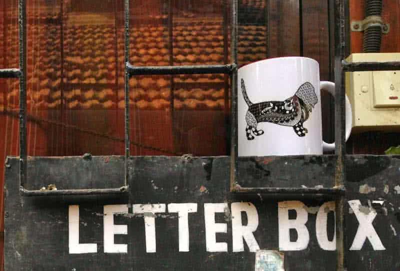 Lifestyle craft titled 'Rufus Mug 3', 4x3 inches, by artist Rithika Kumar on Ceramic