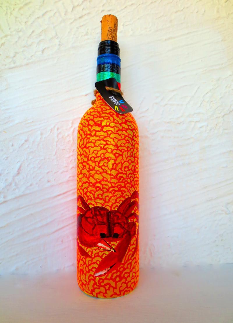Lifestyle craft titled 'Sandy Crab Hand Painted Glass Bottles', 12x3x12 inches, by artist Rithika Kumar on Recycled Glass