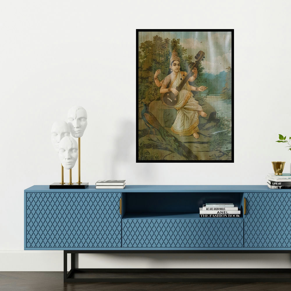 'Saraswati 7 (Saraswati, Goddess of the Arts)' painting by Raja Ravi Varma shown on a wall in a furnished room.