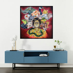 'Split Personality (Woman with Animal Heads)' painting by Minal Rajurkar shown on a wall in a furnished room.