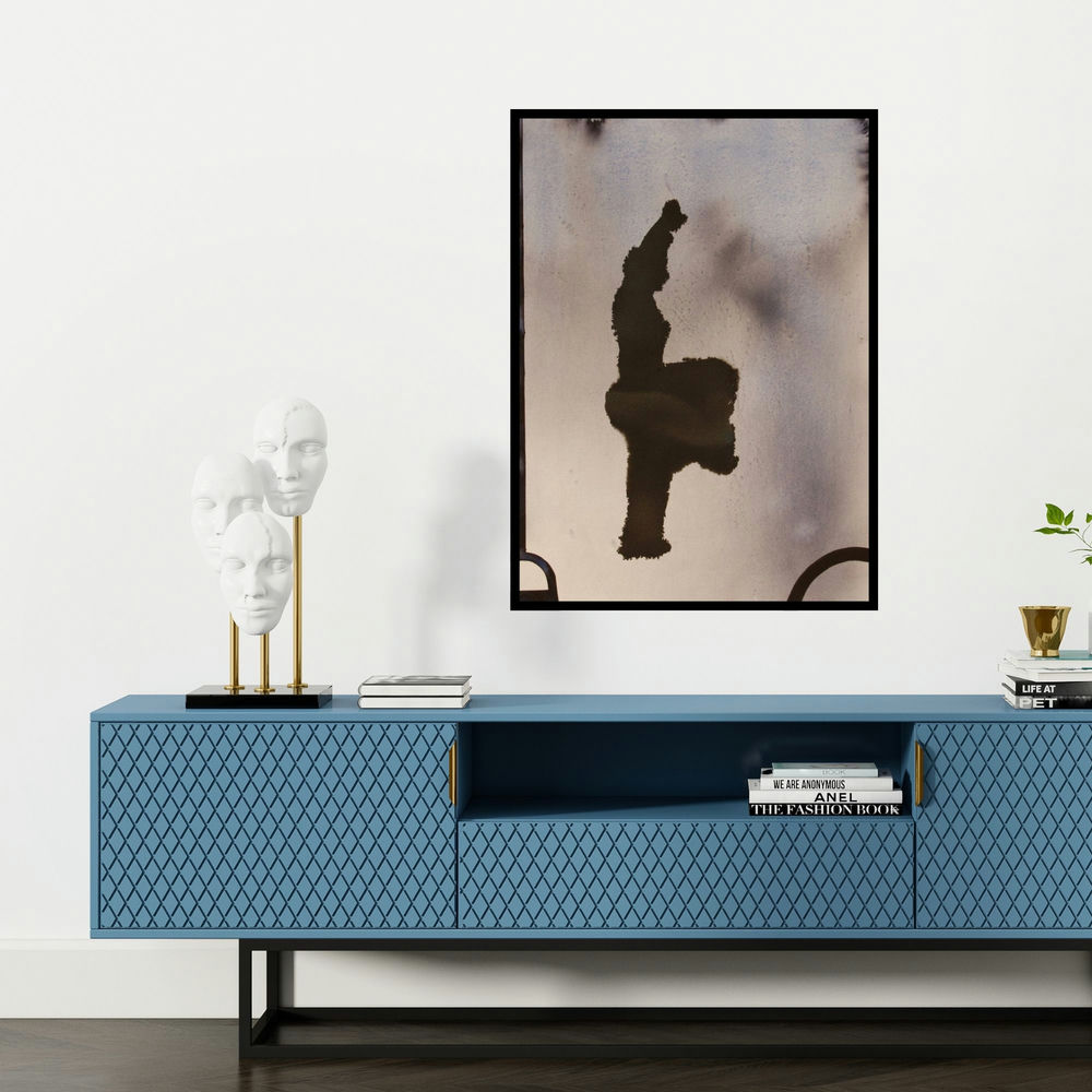 'Standing Man 2 (Urban Meditation: A Figurative Composition)' painting by Manish Sutar shown on a wall in a furnished room.