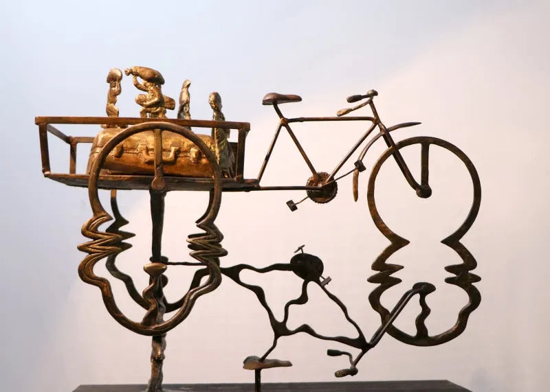 Figurative sculpture titled 'The Story Of Immigrants', 20x10 inch, by artist Rohan Pawar on Brass