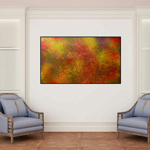 'Story Of A Valley (The Harvest Moon)' painting by Aditi Chakravarty shown on a wall in a furnished room.