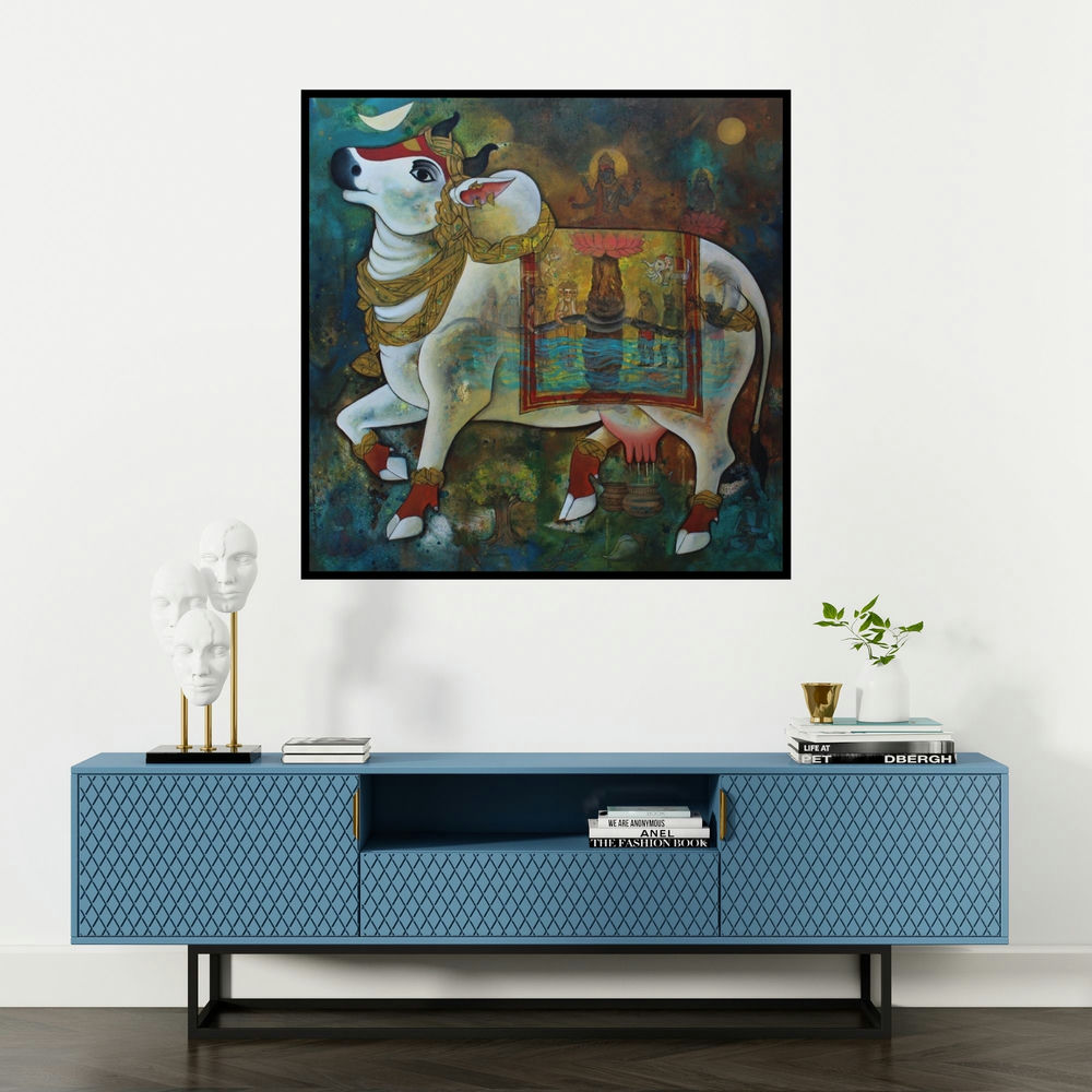 'Surabhi (Nandi: The Divine Bull)' painting by N P Rajeshwarr shown on a wall in a furnished room.