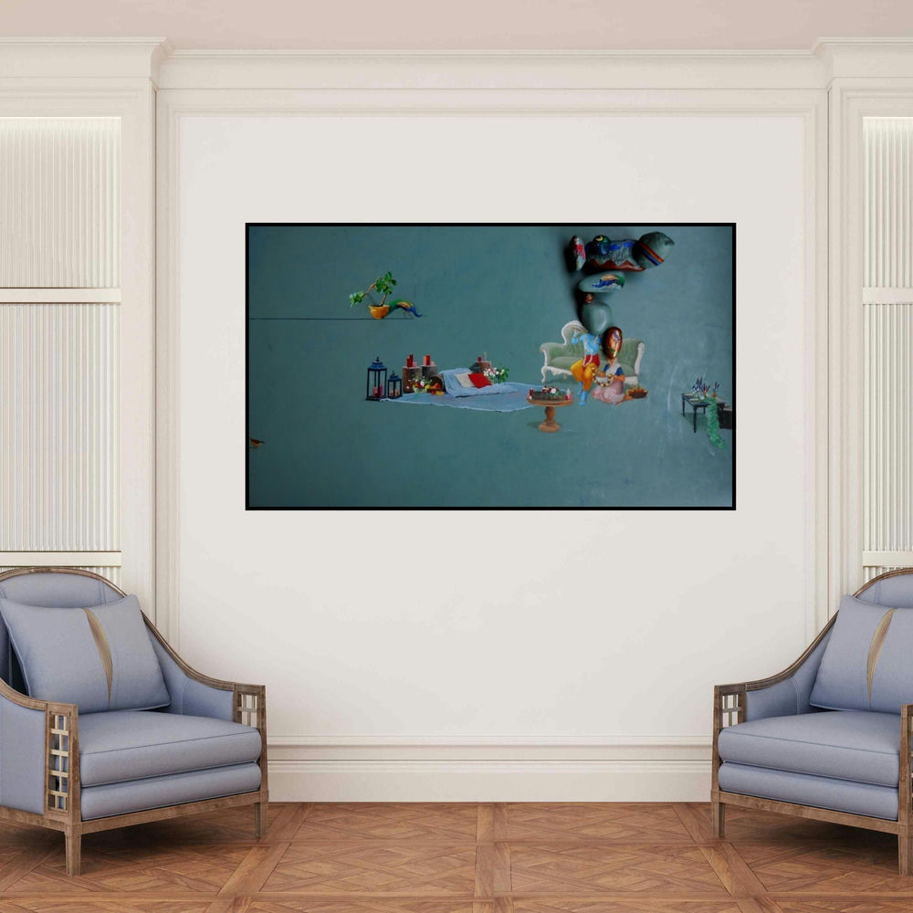 'Untitled 1 (Celestial Embrace)' painting by Pragnesh Patel shown on a wall in a furnished room.