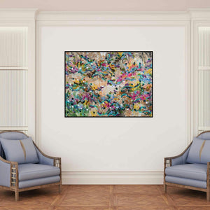 'Untitled 2 (A Flourish of Color**)' painting by Sheena Bajaria shown on a wall in a furnished room.
